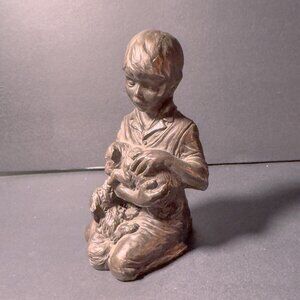 "Boy with Puppies" figurine